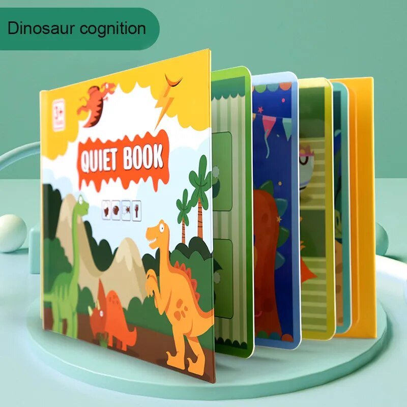 Montessori Quiet Book with dinosaur illustrations on a green background for toddler animal learning.