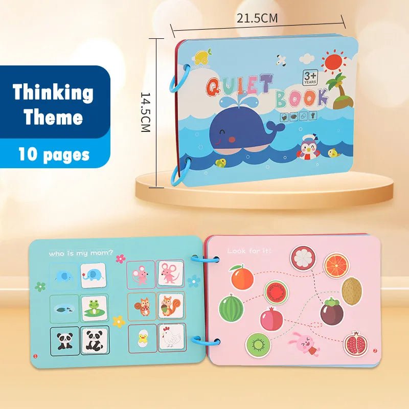 Montessori Quiet Book with a whale illustration and educational pages displayed on a wooden shelf.