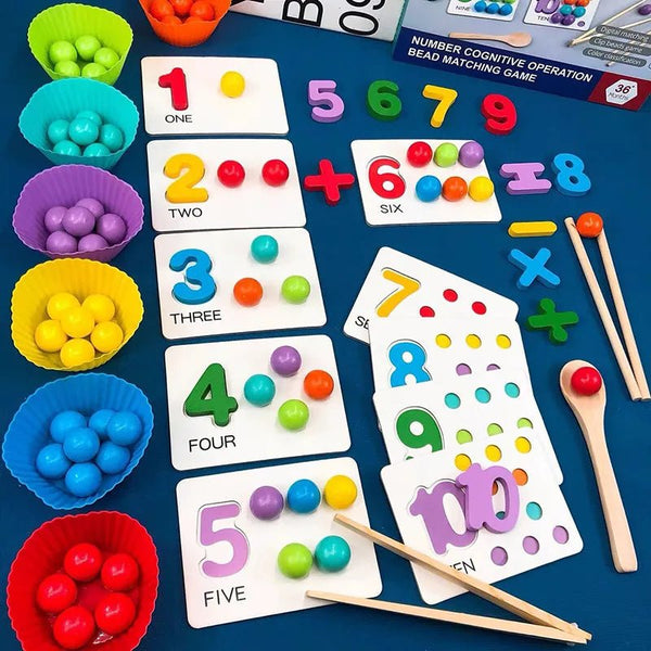 Educational children's toys with numbers, letters, and colorful beads on a blue surface.