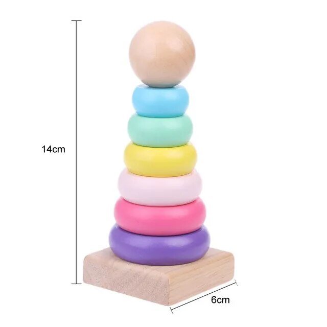 Montessori wooden stacking rings toy for babies practicing hand-eye coordination during playtime.