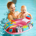 Mother holding baby in a colorful inflatable swim ring seat for pool bonding time.