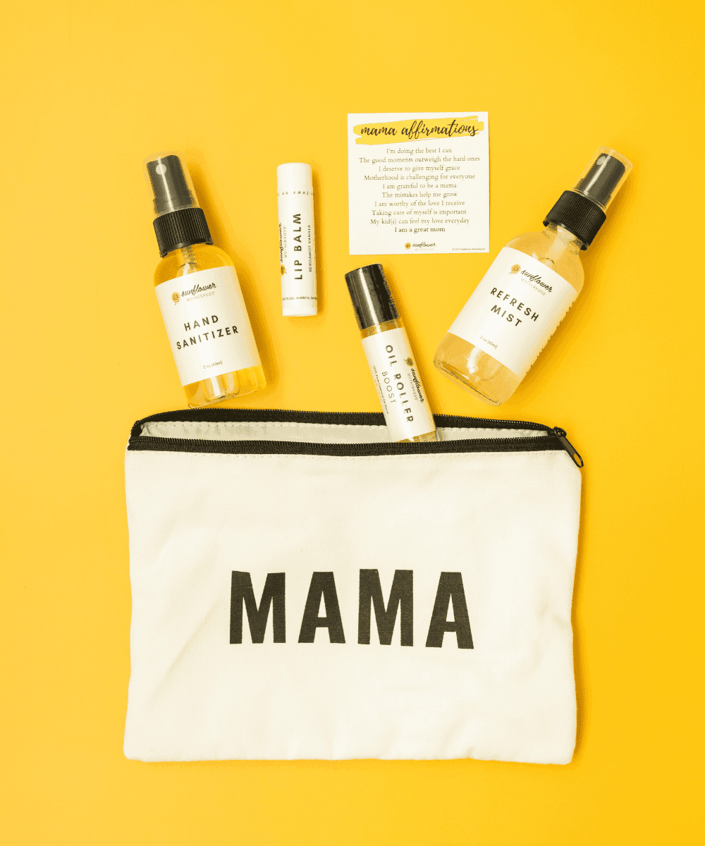Motherhood self-care pouch bundle with skincare products laid out for daily pampering, baby shower gifts, and postpartum care.