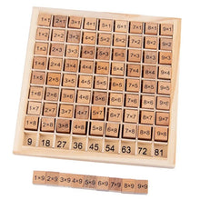 Montessori wooden multiplication board for kids with numbers and a small ruler for measuring and math practice.