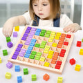 Montessori wooden multiplication table learning board for kids practicing times tables through hands-on play.