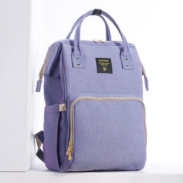 Purple backpack with a visible brand logo.