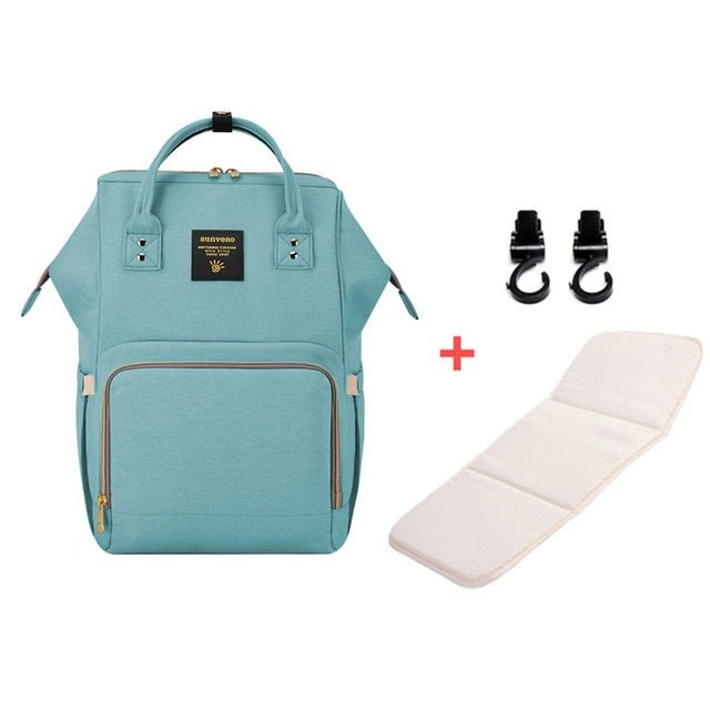 Teal backpack with additional items 