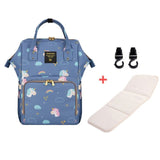 Blue backpack with unicorn pattern, white mat, and black clips 