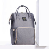 Gray backpack with a visible brand label