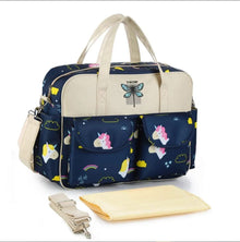 Navy Waterproof Maternity Diaper Bag styled as a roomy travel carryall for hospital bags, weekend trips, and everyday baby care.