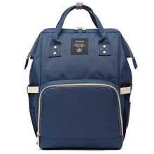Navy and white nappy backpack carry view built for maternity daily baby care essentials.