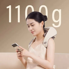 Heated neck massager worn hands-free while using a smartphone for relief on the go.