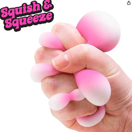 Pink and white squishy toy being held in a hand with 'Squish & Squeeze' text above.