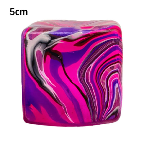 Colorful marbled cube with dimensions indicated 