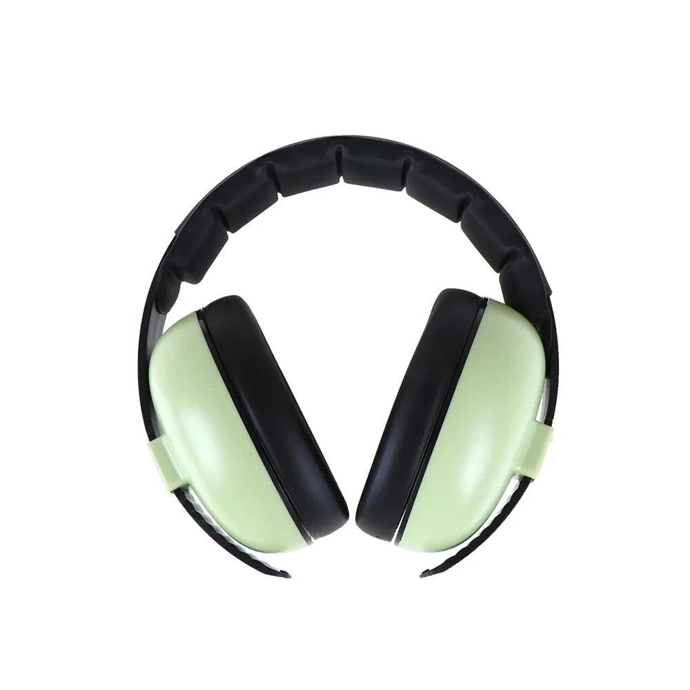 Neon green baby sleep earmuffs with black straps for use in loud environments.