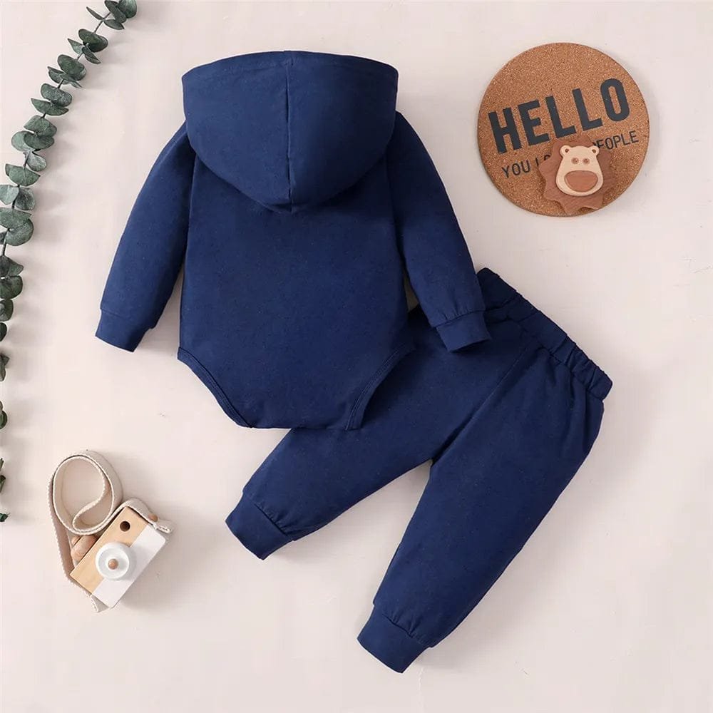 Newborn boy navy hoodie and jogger pants two-piece set styled for everyday comfort and stroller walks.