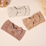 Three headbands with large bows