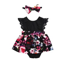 Full view of the black lace and floral skirt newborn romper for summer occasions and family photos.