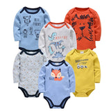 Set of colorful baby bodysuits with various designs