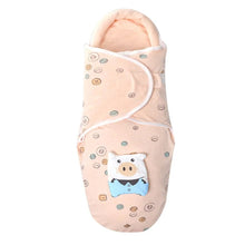 Newborn sleep sack in a cartoon print, styled as a cosy blanket alternative for safer cot sleeping.