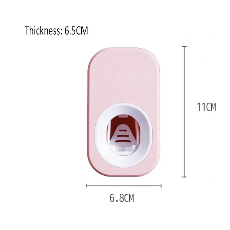 Pink toothpaste dispenser.