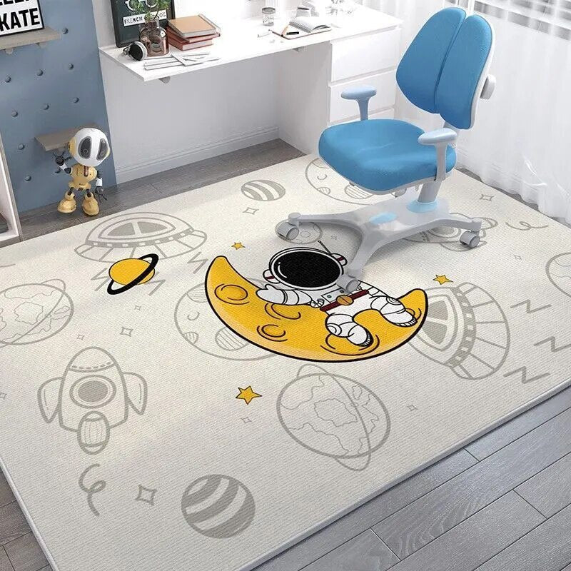 Children's room with a blue chair on a space-themed rug