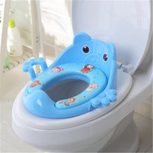 Blue children's toilet seat with cartoon design on a white toilet. (option 2)