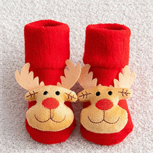 Non-slip Cotton Kids Socks in red reindeer print booties for toddlers and infants on winter walks.