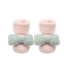 Non-slip Cotton Kids Socks in pink fuzzy top booties with green checkered bows for toddler girls.