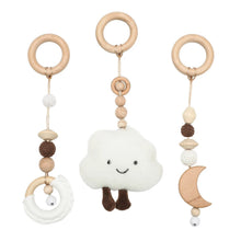 Baby teething toy with cloud-shaped center and wooden elements