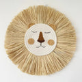 Nordic handmade lion wall decor in woven cotton and straw for nursery walls and boho kids room styling.