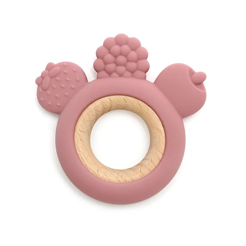 Pink silicone teething ring with textured surface 