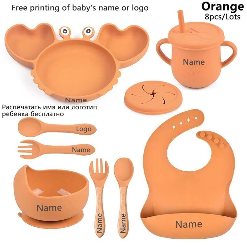 Orange crab baby dining kit with plate, bowl, cup, and cutlery for daily toddler use and family meals.