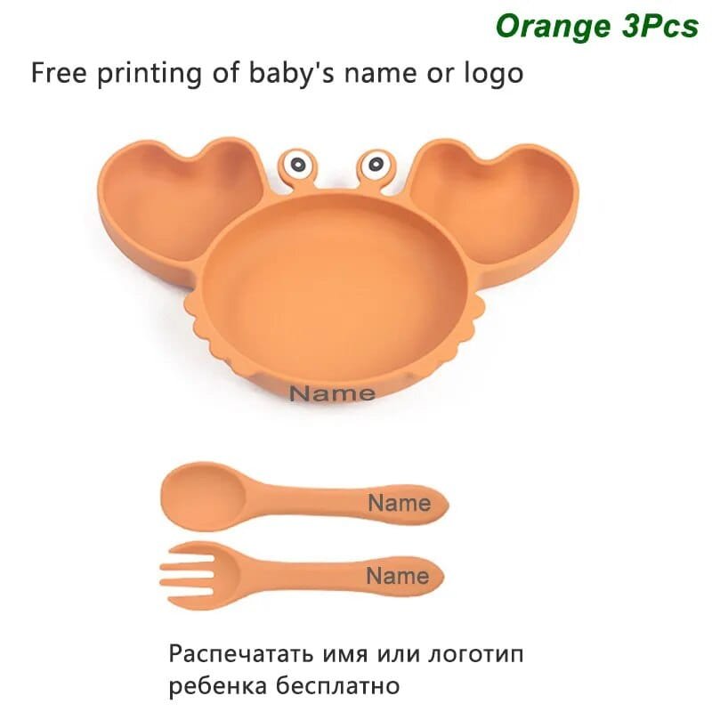 Orange crab design baby plate with spoon and fork for toddler self-feeding practice at home and nursery.