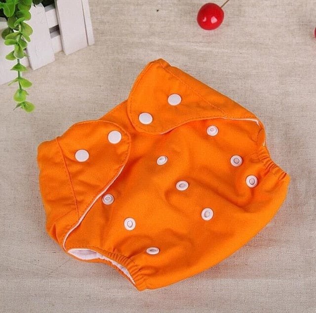 Orange Washable Reusable Nappy cloth training pant for daily nappy changes and gentle potty training practice.