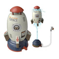 Outdoor rocket water pressure sprinkler toy for kids, launching with garden hose water for summer backyard play.