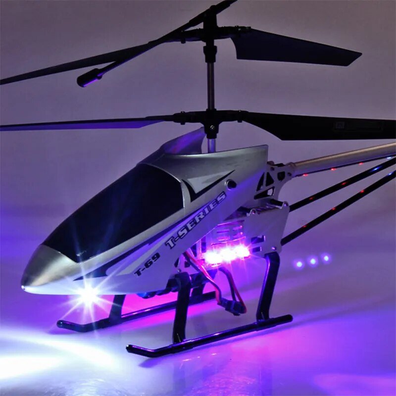 Toy helicopter with LED lights on a reflective surface