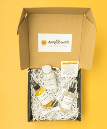 Pampering self care gift box packaged with a sunflower label for birthdays, new mom gifts, and self-care treats.
