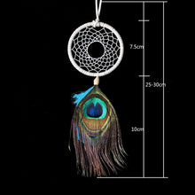 Peacock feather dream catcher with a rattan hoop frame, shown with a size chart.