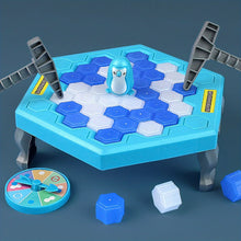 Blue ice table with a penguin, two hammers, a spinner and loose ice blocks on a dark blue background