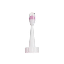 White and pink Peri Bottle nozzle head detail for controlled postpartum cleansing flow.
