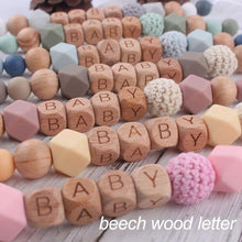 Personalised beaded dummy clip chain with teether toy to stop pacifiers falling during pram outings and playtime.