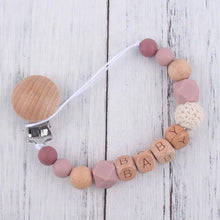 Design option one of the personalised pacifier clip and teether with baby name for teething comfort and gifting.