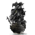 Piececool 3D pirate ship metal puzzle kit assembled, a DIY building toy for teens to display after completion.