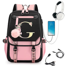 Pink and black backpack with floral design, smartphone, headphones, and USB cable.