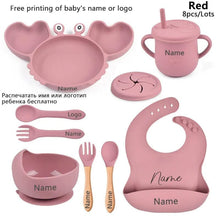 Pink baby crab feeding set with cup, bowl, and utensils, a weaning bundle for daily meals and snacks.