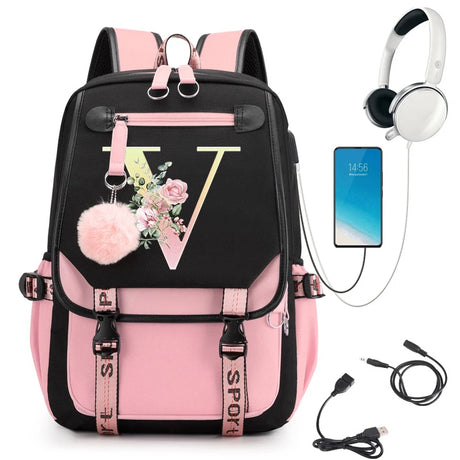 Pink and black backpack with floral 'V' design, pom-pom, and USB cable.