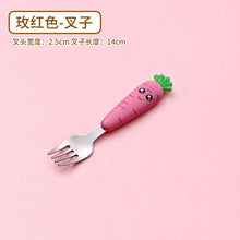 Pink carrot-shaped baby fork utensil for confident toddler self-feeding.