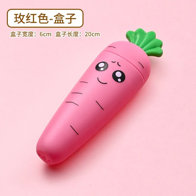 Pink carrot-shaped baby tableware container with a smiling face for playful mealtime.