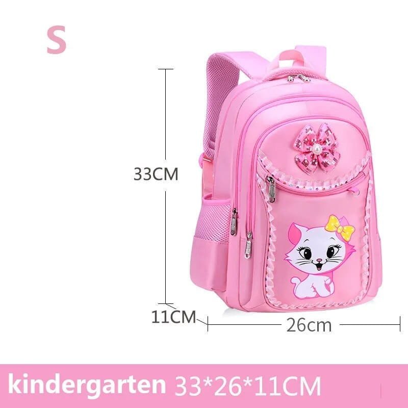 Pink cat backpack shown with measurements, a school essentials set for girls starting primary lessons.