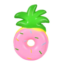 Pink donut and pineapple squishy toy for novelty squeeze play, gifting, and sensory fidgeting.
